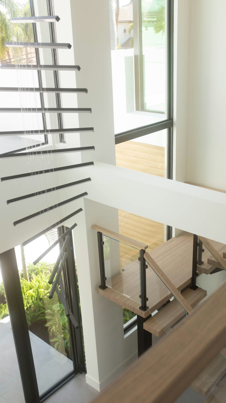 Staircase with glass railing